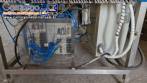Envasadora dosadora seladora rotativa em inox com selo de alum�nio para potes, copos e frascos Delgo