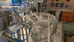 Envasadora dosadora seladora rotativa em inox com selo de alum�nio para potes, copos e frascos Delgo